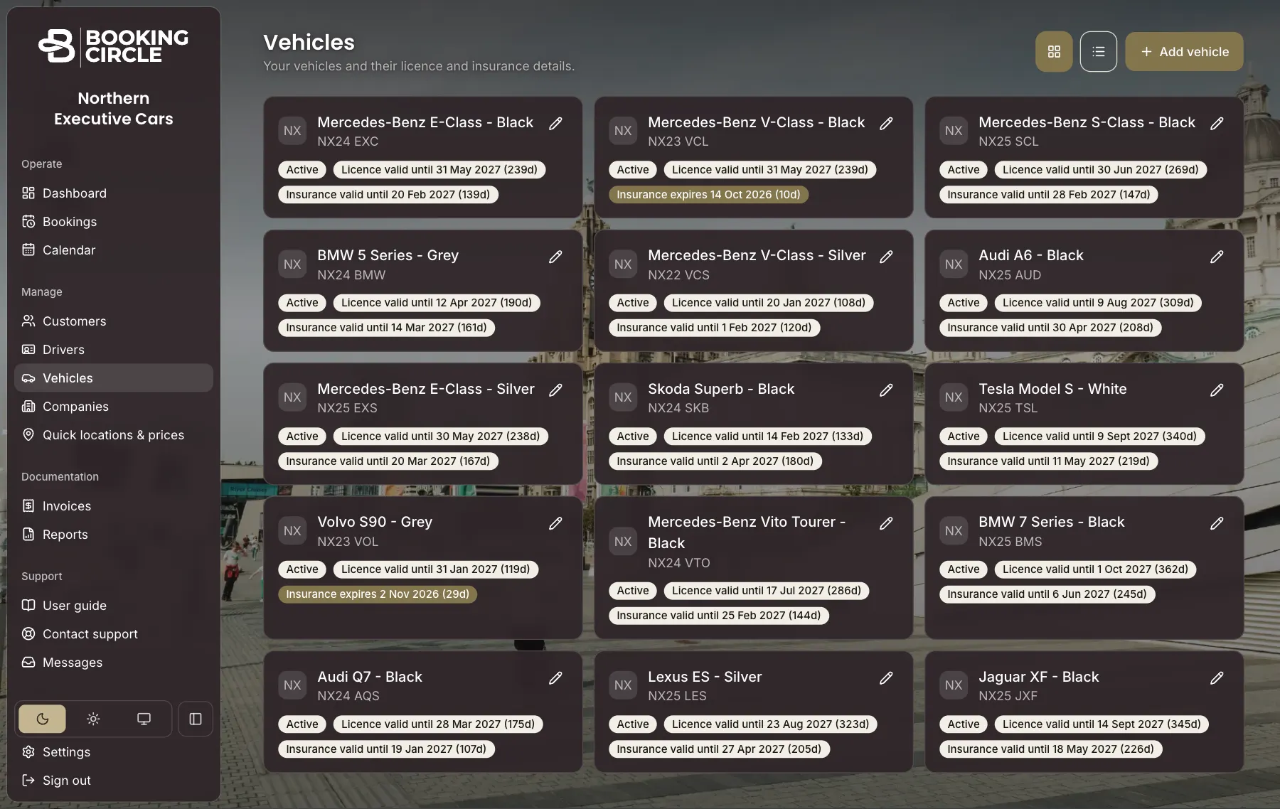 The Vehicles screen: vehicles as cards with their registration, licence and insurance dates, two insurance dates shown in a warning colour.